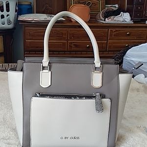 A tote handbag g by Guess